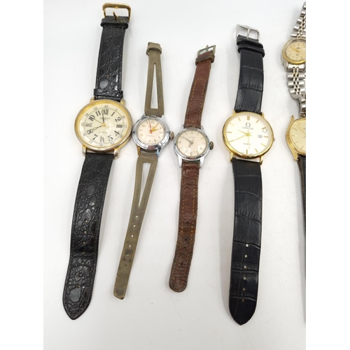 1101 - A large collection of assorted vintage wristwatches to include Casio analogue/digital quartz, Amido ... 