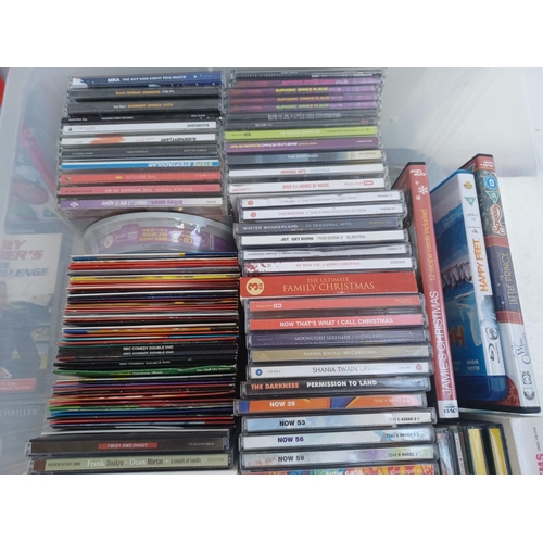 390 - A collection of CDs and DVDs; CDs to include Now 39, 53, 56, 59, 64,69 and 72, Razorlight, Jet, Base... 