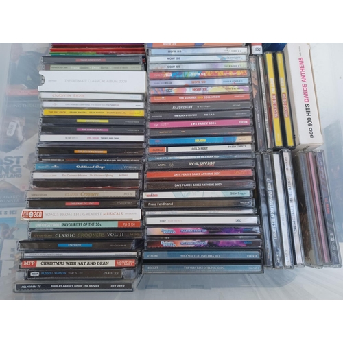 390 - A collection of CDs and DVDs; CDs to include Now 39, 53, 56, 59, 64,69 and 72, Razorlight, Jet, Base... 