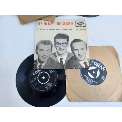 392 - A collection of Buddy Holly, Elvis Presley, Roy Orbison, The Beatles and Duane Eddy vinyl records.