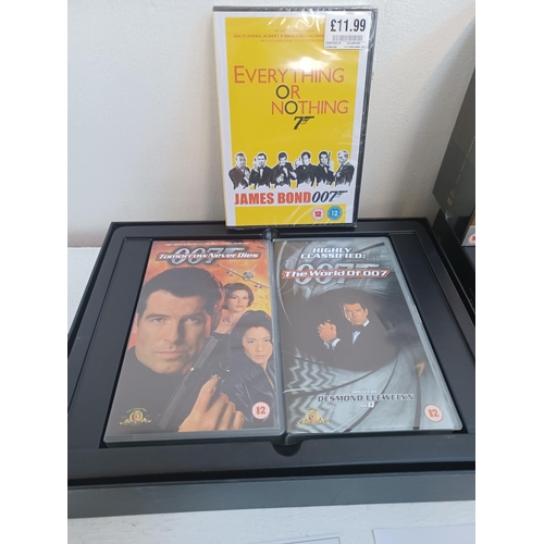 393 - Three James Bond items, one sealed Ultimate DVD Collection 22 film set, one sealed Everything For No... 