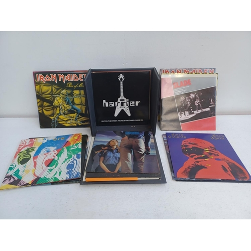 395 - A record box containing a collection of rock vinyl records to include Ozzy Osbourne, Iron Maiden, Ha... 