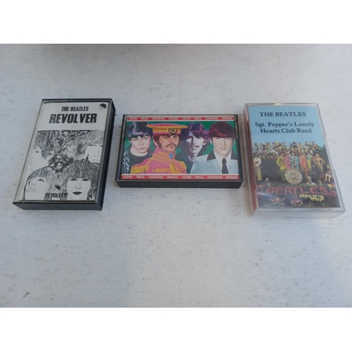 397 - A collection of The Beatles compact cassettes including some rare and unusual titles.