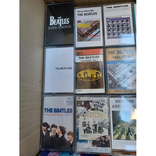 397 - A collection of The Beatles compact cassettes including some rare and unusual titles.