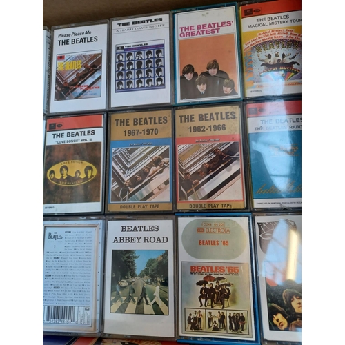 397 - A collection of The Beatles compact cassettes including some rare and unusual titles.