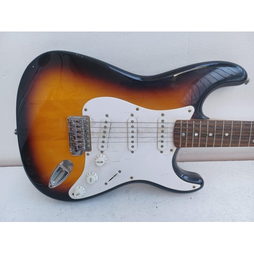 402 - Two items, one Squier Affinity sunburst Stratocaster electric guitar and one Squier SP10 practice am... 