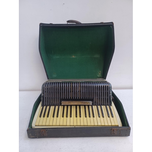 406 - A cased Italian Scandalli 120 bass 41 key piano accordian