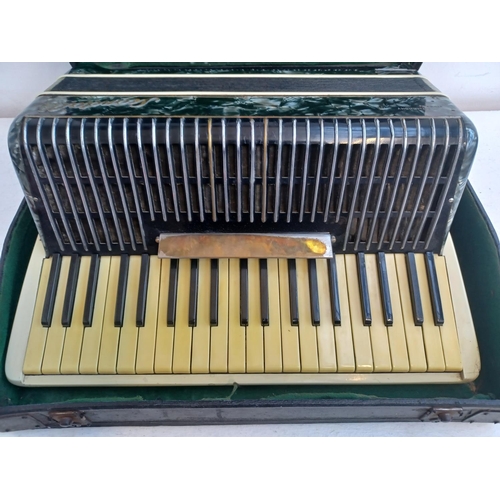 406 - A cased Italian Scandalli 120 bass 41 key piano accordian