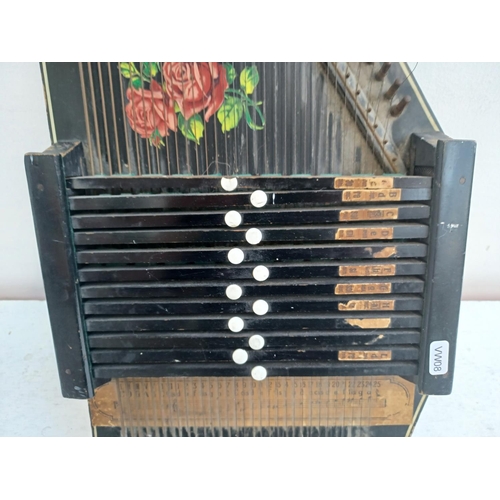 409 - A vintage autoharp with rose design