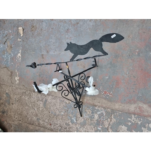 519 - A Victorian style wrought iron weather vane