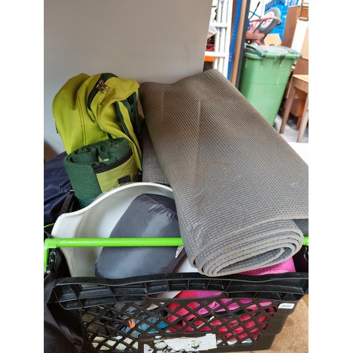 485A - A collection of camping equipment to include mats, Regatta backpack, Coutwell sleeping bag etc.