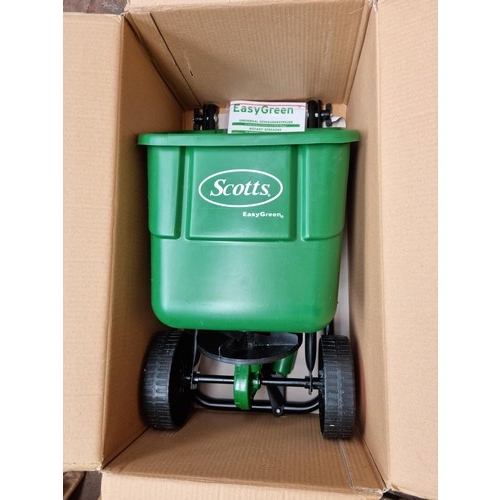 487B - A boxed Scotts EasyGreen lawn spreader