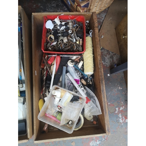 588 - Six boxes containing a collection of assorted items to include vintage P & B bench vice, hand saws, ... 