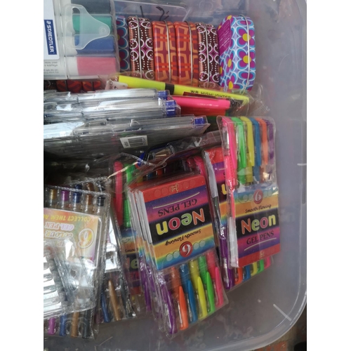 590 - Two boxes containing a collection of assorted items to include pens, comics etc.