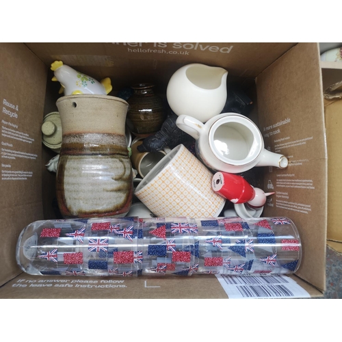 592 - Four boxes and one bag containing a large collection of assorted items to include studio pottery, fr... 