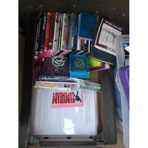 598 - Four boxes containing a collection of assorted items to include Philips iron, weighing scales, DVDs,... 