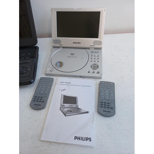 367 - Two portable DVD players, one Philips PET800 with remotes and instruction manual and one HKC with re... 