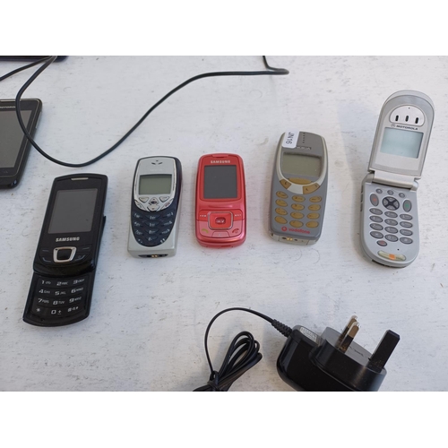 374 - A collection of mobile phones to include Motorola, HTC, Nokia and Samsung.