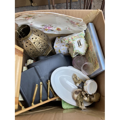 526 - Two boxes containing a collection of assorted items to include treenware, glassware, ceramics, Victo... 