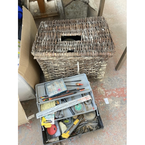 527 - Three boxes and one vintage wicker fishing basket containing a collection of assorted items to inclu... 