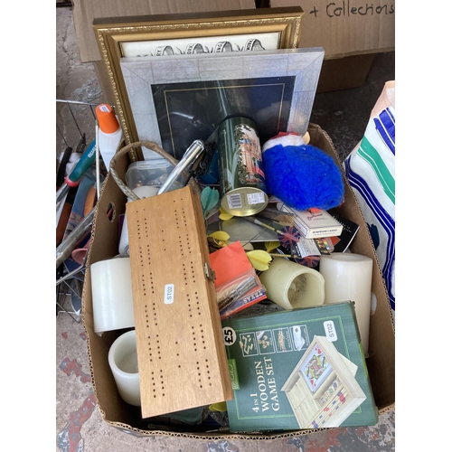 527 - Three boxes and one vintage wicker fishing basket containing a collection of assorted items to inclu... 