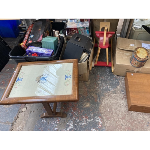 548 - Four boxes containing a large collection of assorted items to include vintage mahogany framed bevell... 