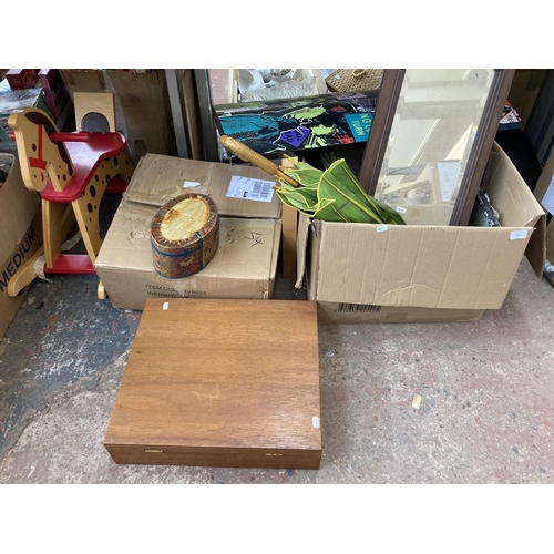 548 - Four boxes containing a large collection of assorted items to include vintage mahogany framed bevell... 