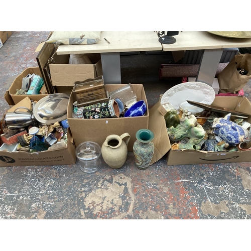 551 - Three boxes containing a large collection of assorted items to include ceramics, glassware, copper w... 