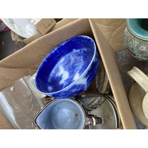 551 - Three boxes containing a large collection of assorted items to include ceramics, glassware, copper w... 