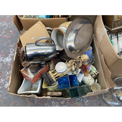 551 - Three boxes containing a large collection of assorted items to include ceramics, glassware, copper w... 