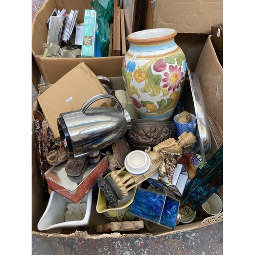 551 - Three boxes containing a large collection of assorted items to include ceramics, glassware, copper w... 