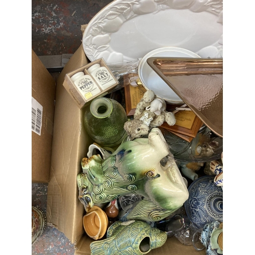 551 - Three boxes containing a large collection of assorted items to include ceramics, glassware, copper w... 