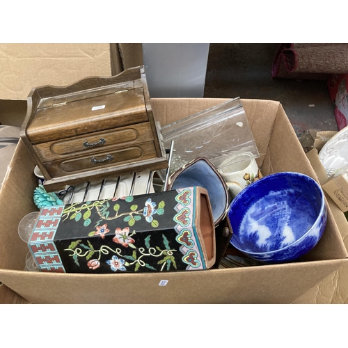 551 - Three boxes containing a large collection of assorted items to include ceramics, glassware, copper w... 