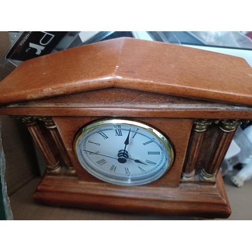 575 - Two boxes containing a collection of assorted items to include 19th century style mantle clock, cera... 