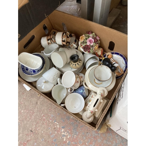 560 - Ten boxes containing a large collection of assorted items to include glassware, Royal Worcester Eves... 