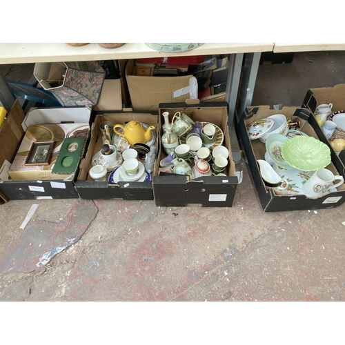 560 - Ten boxes containing a large collection of assorted items to include glassware, Royal Worcester Eves... 