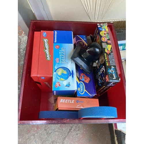 571 - Six boxes containing a large collection of assorted items to include vintage slides, soft toys, boxe... 