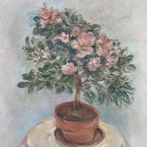 192 - A mid 20th century Stella Steyn (1907-1987) unframed oil on canvas of a floral still life scene bear... 