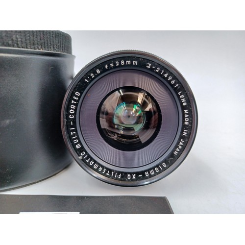 210 - A cased Sigma XQ f=28mm 1:2.8 Filtermatic Wideangle lens with instructions