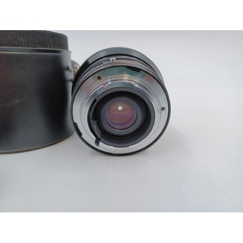 210 - A cased Sigma XQ f=28mm 1:2.8 Filtermatic Wideangle lens with instructions