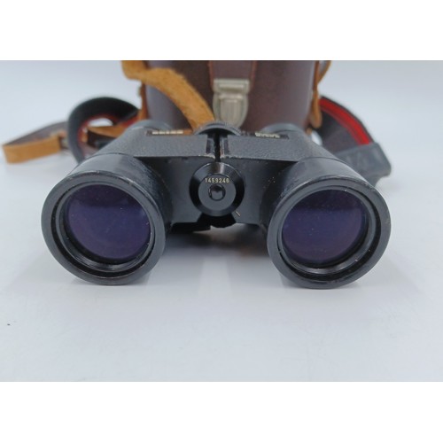 220 - A cased pair of Zeiss Dialyt 8 x 30 B binoculars