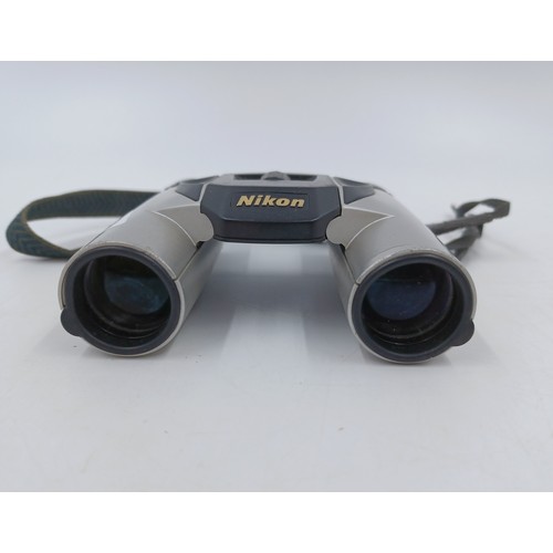 221 - A pair of Nikon Sportstar 10 x 25 pocket binoculars