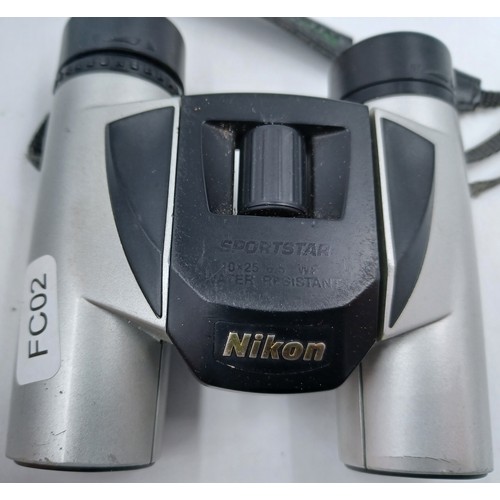 221 - A pair of Nikon Sportstar 10 x 25 pocket binoculars