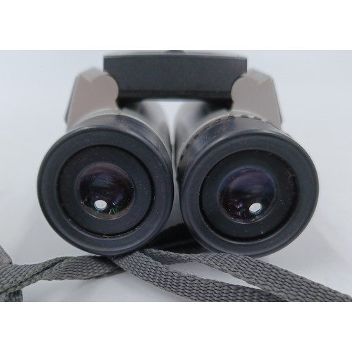 221 - A pair of Nikon Sportstar 10 x 25 pocket binoculars