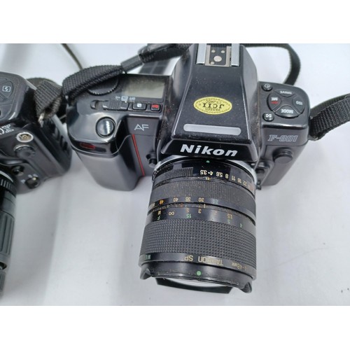 231 - Two Nikon 35mm SLR cameras, one F-801 fitted with Tamron SP wide zoom 24-48mm 1:3.5-3.8 lens and one... 