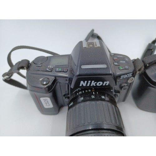 231 - Two Nikon 35mm SLR cameras, one F-801 fitted with Tamron SP wide zoom 24-48mm 1:3.5-3.8 lens and one... 