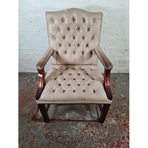 99 - A mahogany and off white leatherette Gainsborough chair - approx. 101cm high x 65cm wide x 53cm deep