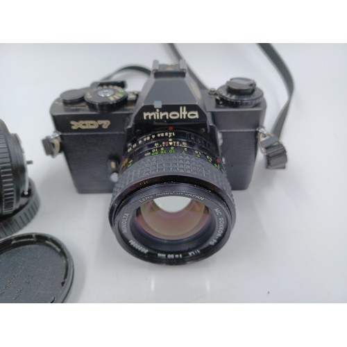 234 - Four items, one Minolta XD7 35mm SLR camera fitted with MC Rokkor-PG 1:1.4 f=50mm lens, one Minolta ... 