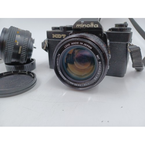 234 - Four items, one Minolta XD7 35mm SLR camera fitted with MC Rokkor-PG 1:1.4 f=50mm lens, one Minolta ... 