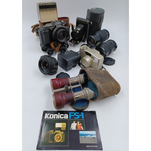 237 - A collection of camera and optical equipment to include cased Konica Hexanon AR 200mm F4 lens, Konic... 